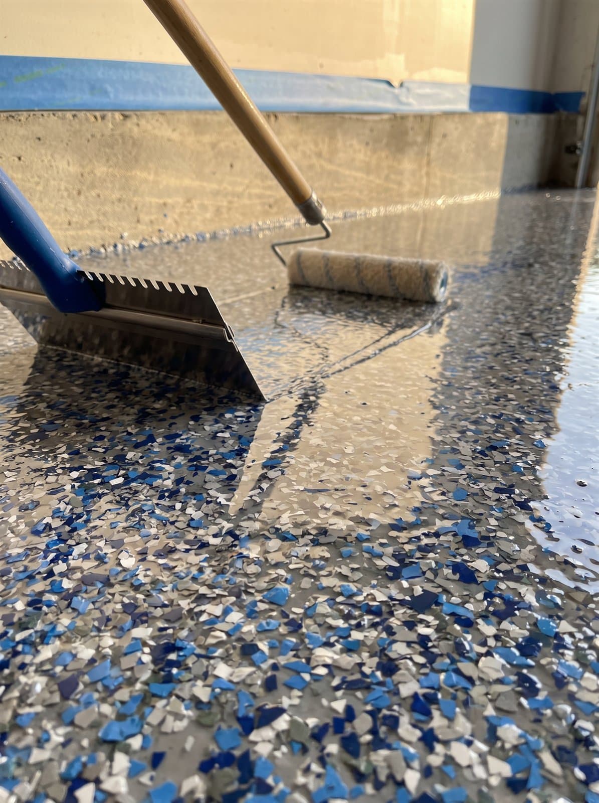 Professional epoxy floor application by RamRock Coatings