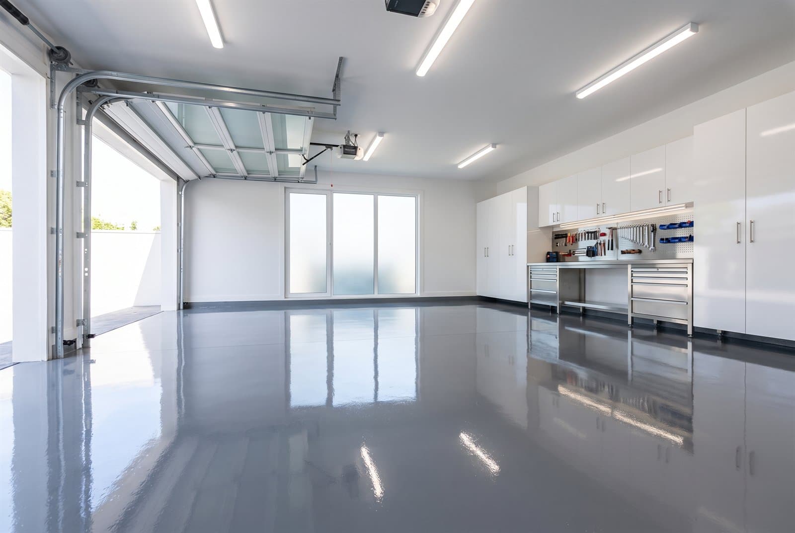 High-gloss residential garage epoxy floor installation